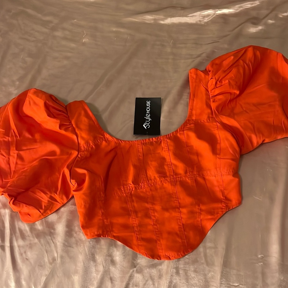 Orange v shape top